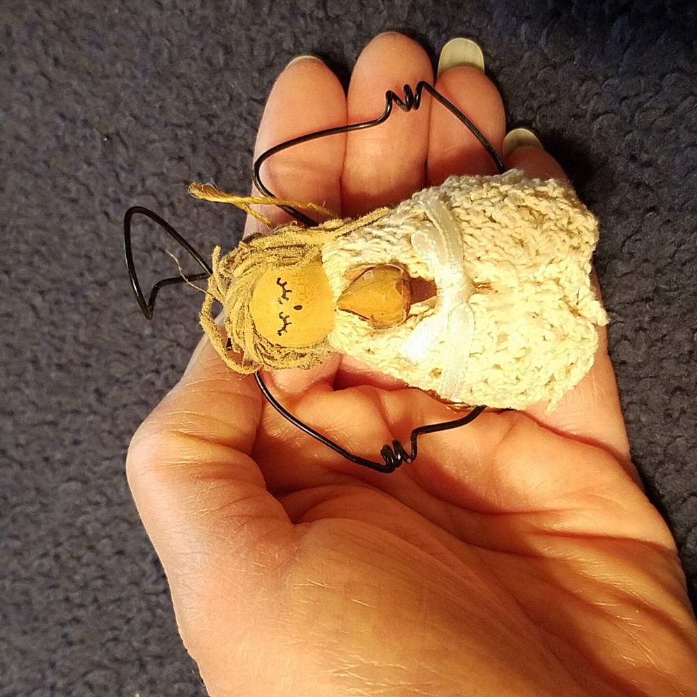 Small, rustic, handmade angel decoration. So sweet!